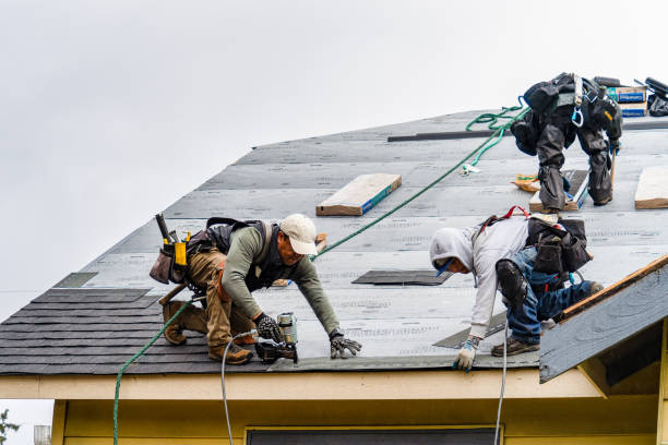 Professional Emergency Roof Repair technician working in Teaneck, NJ